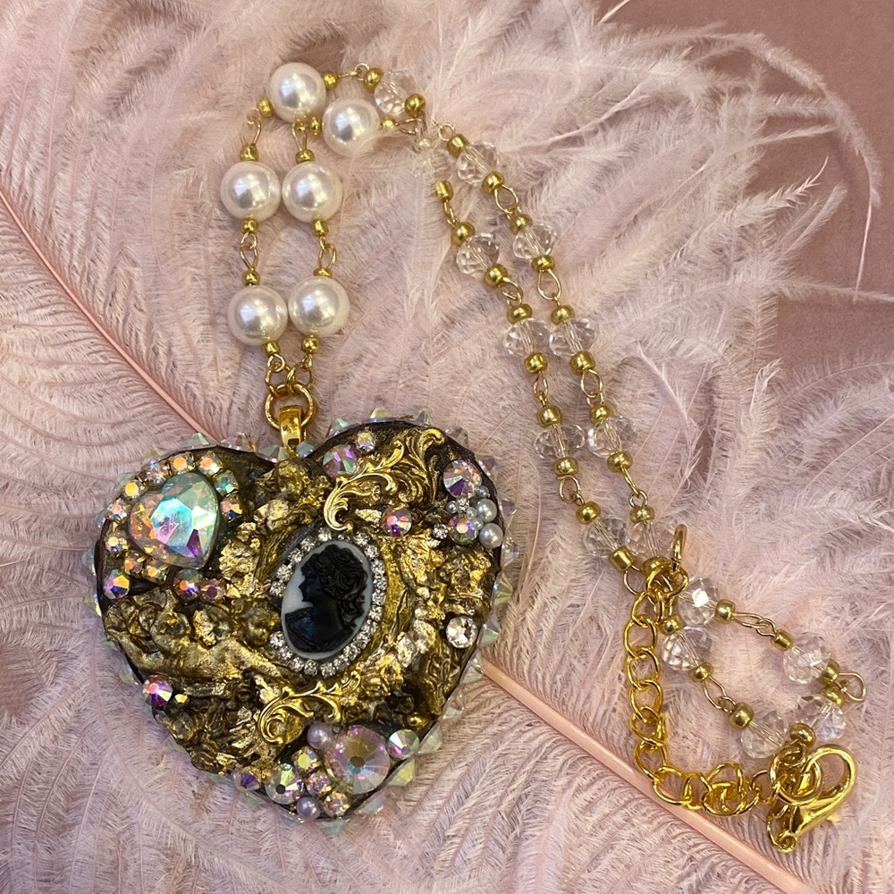 Large heart cherub necklace